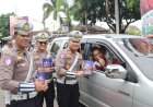 Operasi-Zebra-Semeru-Polres-Magetan-Berbagi-Bunga-dan-Coklat-Ajak-Warga-Tertib-Lalin